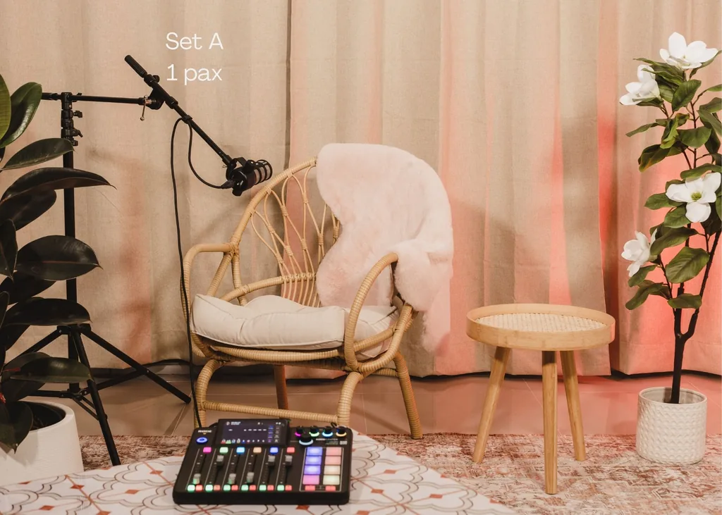Set A: wicker chair, microphone and mixer with warm curtains and white flowers