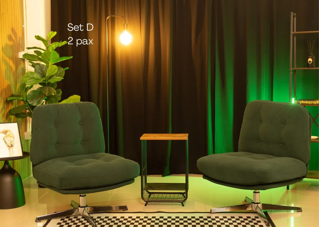 Set D: two green armchairs under green and warm light